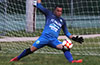 Diego Pitirris of FC Palora saving the shot taken by Donald Martinez of FC Tuxpan(#14)