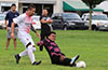 Cristian Compuzano of FC Tuxpan,sliding to steal the ball from Santiago Gutierrez of FC Palora