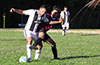 Maical Parra of Sag Harbor(left) and Robert Velez of East Hampton SC fighting for the ball