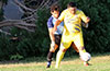 East Hampton SC goalie, Esteban Aguilar, protecting the goal from Cristian Compuzano of FC Tuxpan(front)