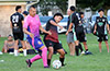Julian Valencia of FC Tuxpan(left) and Mateo Guaman of Liga de Gulag fighting for the ball