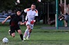 Jorge Lopez of FC Tuxpan(rear) watching what Santiago Solis will do