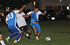 Manuel Ramos of Tortorella Pools(right) being held off from the ball