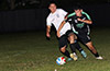 Brandon Ospina of Maidstone Market(right) getting by a Suchos United defender