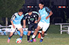 Maicol Parra of Maidstone Market(center) and get the ball from Marvin Martinez(left) and Nelson Moran of Napoli