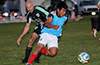 Melvin Pedro of Napoli(front) just too fast for Danny Salazar of Maidstone Market