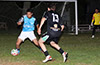 Marvin Martinez(rear) trying to get by Andres Agula of Maidstone Market