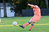 Adolfro Perdomo of FC Tuxpan blasting the ball up the field