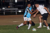 Leo Moran of Napoli(left) pushing off Daniel Londono of Suchos United