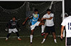 Leo Moran of Napoli(left) and Daniel Londono of Suchos United in front of the Suchos United goal