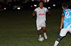 Bryan Siranaula of Suchos United taking on a Napoli defender