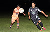 Gustavo Carreto of FC Tuxpan(left) and John Romero Jr. going for the ball