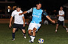Donald Martinez of Napoli being guarded by Lenis Vera of Suchos United(rear)